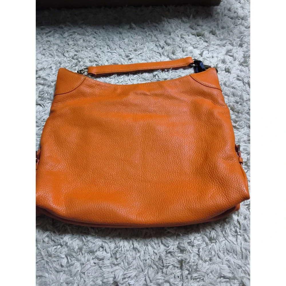 34.Dooney & Bourke Orange Pebbled Leather Hobo Shoulder Bag Silver Hardware